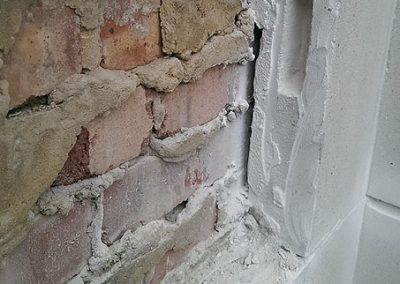 NJC inspecting behind the cladding of an art deco building in London